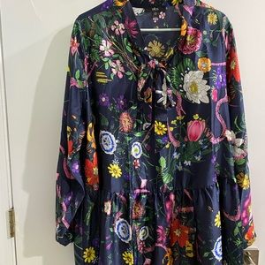 Tie neck peplum tunic